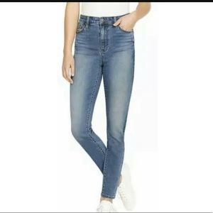 Women’s light wash high rise skinny jeans.
